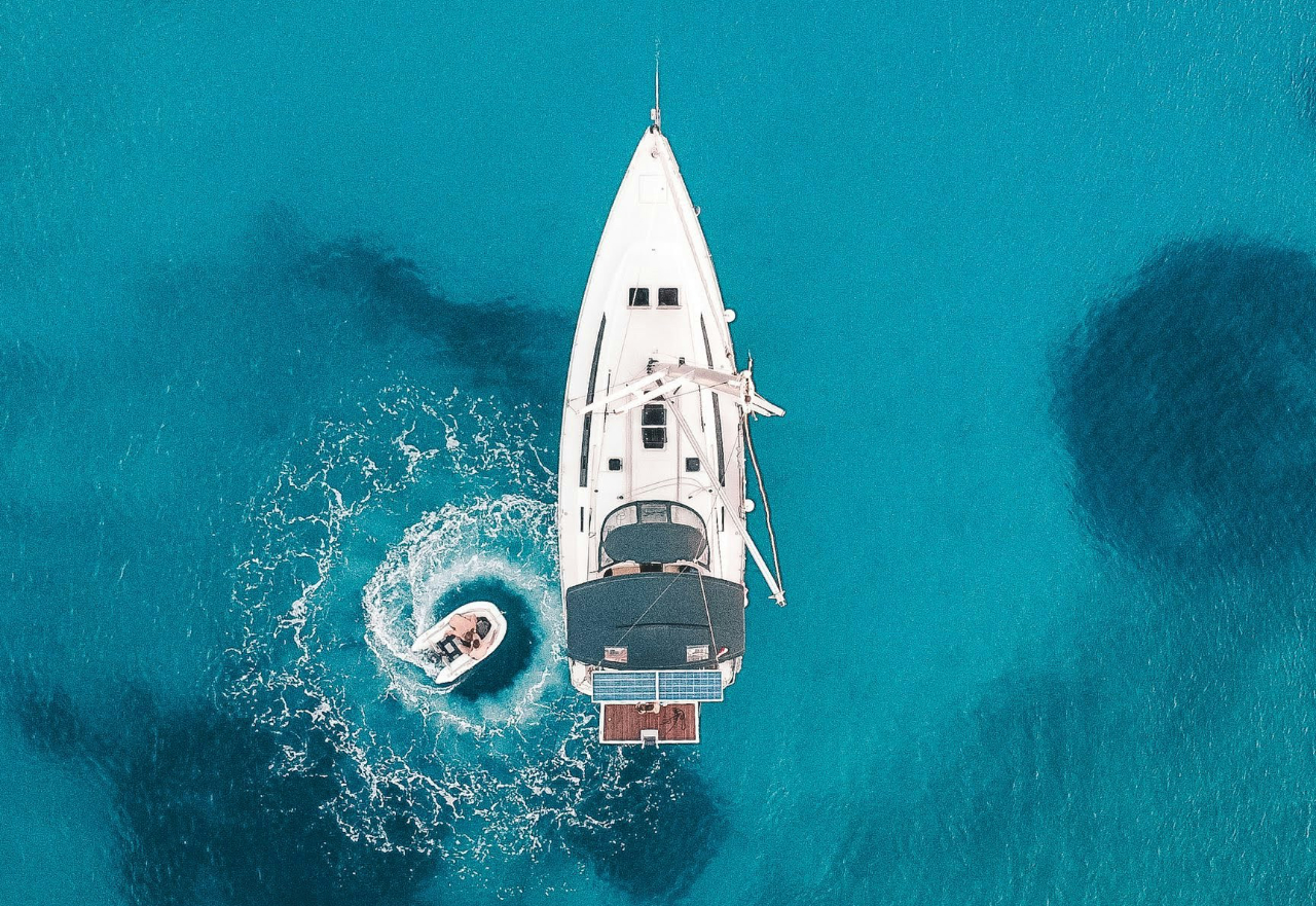 Sailboat anchored in clear turquoise sea in Turkey.jpg