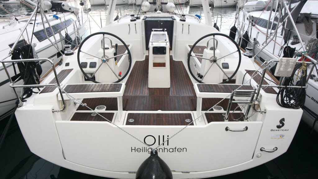 Sailboat stern and twin helm at a marina.jpg